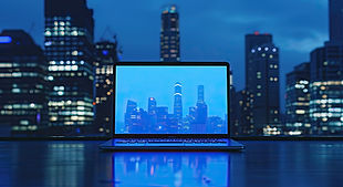 blue-screen-laptop-placed-table-with-skyscraper-background-office-concept.jpg