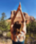 stephanie yoga pose by red rocks.JPG