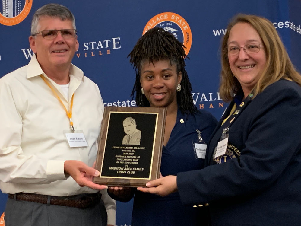 Awarding plaque to recipient