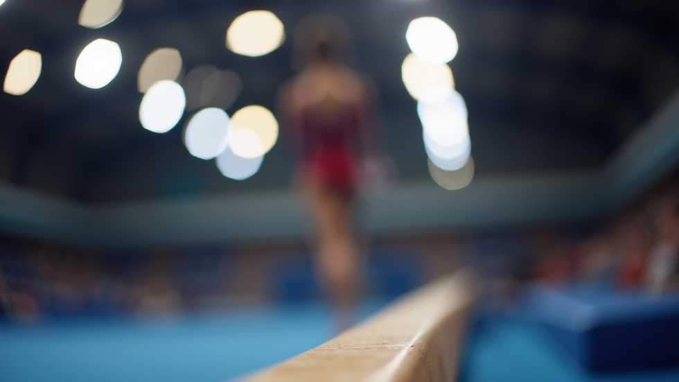 Close-up view of a gymnastics scoring beam under bright lights