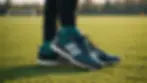 Close-up view of a pair of Gaelic sports shoes on a field