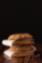 stack of four chocolate chip cookies