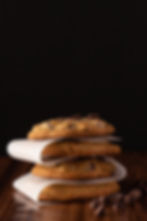 stack of four chocolate chip cookies