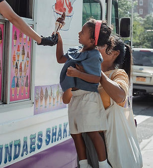 A kid buying an ice cream