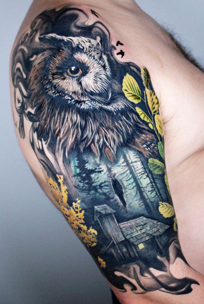 full color forest half sleeve with an owl and a haunted cabin