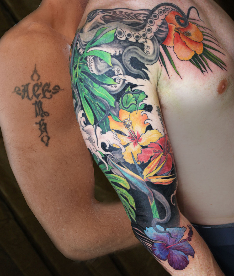 before and after tropical plants tattoo sleeve covering an old cross tattoo