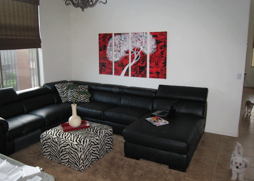The White Tree on red and black background over couch in living room, custom artwork by Kelly Anne Cutter