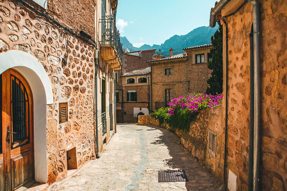 View of a medieval street in the Old Town of the picturesque Spanish-style village Fornalu