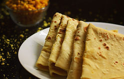 Dholl Puri, A preparation of Whole Wheat Flour with Lentils, It is an iconic street food o