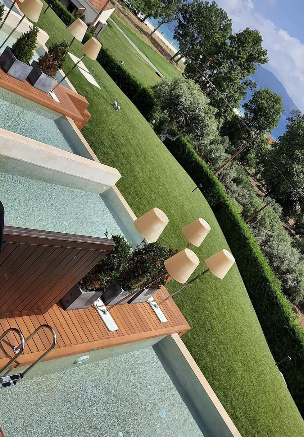 Chalkidiki - Sfeerbeeld van een boetiekhotel met kamers met privé-zwembad