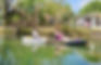 Bare Naked Kayaks and Uncle Art and Aunt Diane paddling a Vanhunks Orca Tandem kayak