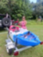 Happy customer with kayak and trailer