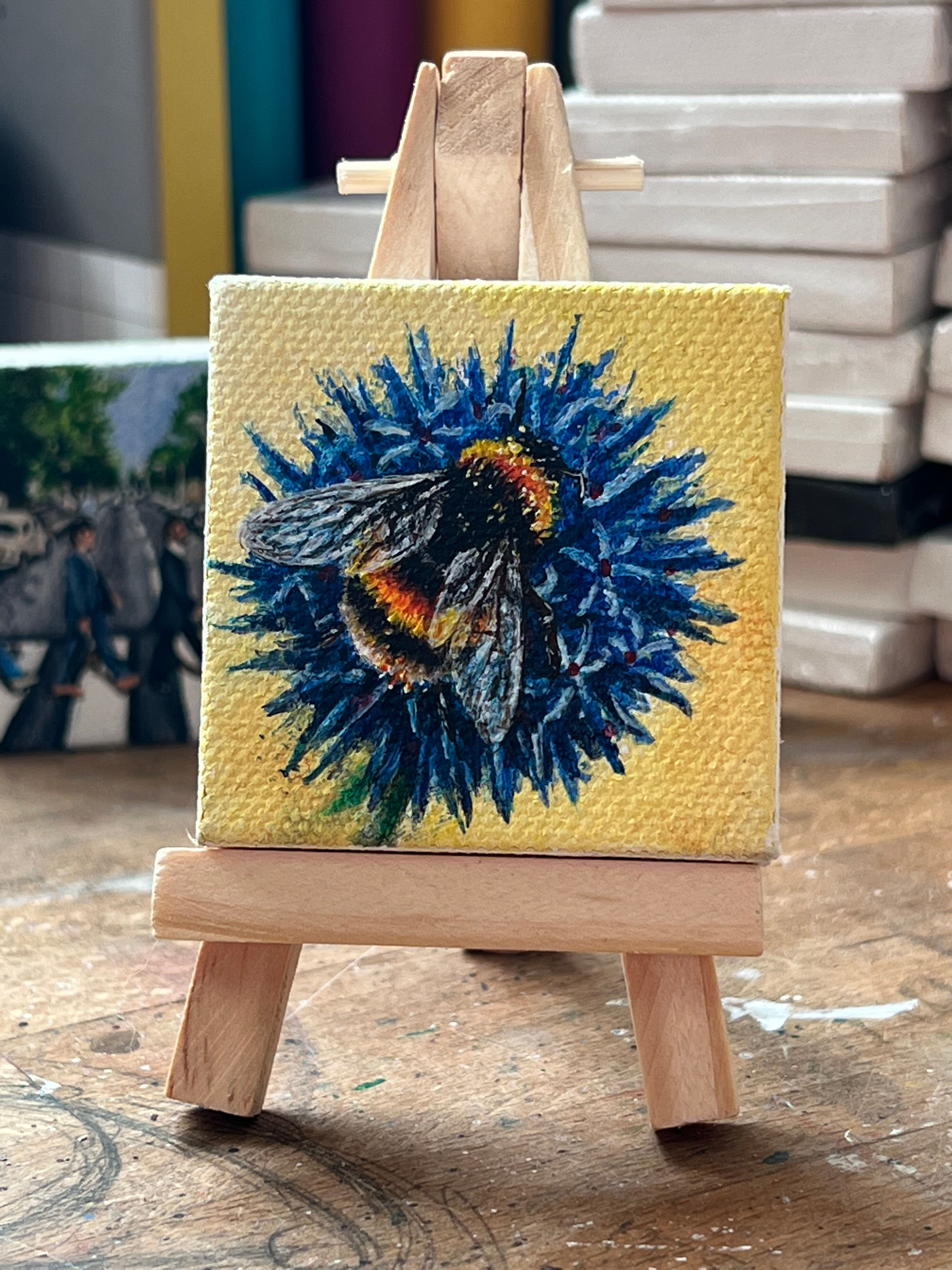 Miniature of a Bee on a Blue Flower