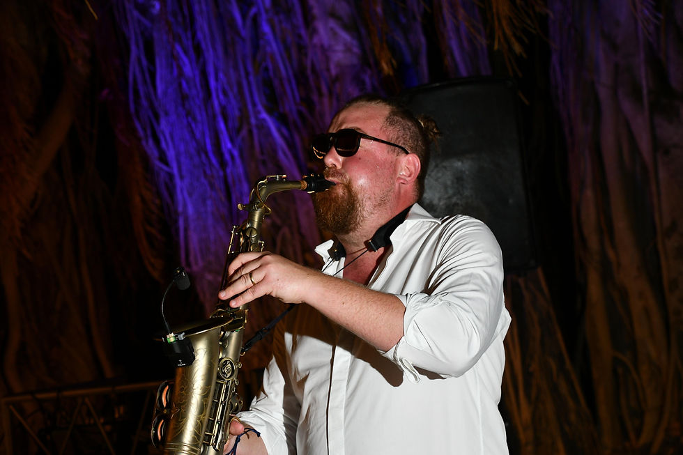 What Are Some Frequently Asked Questions About My Saxophonist At My Destination Wedding?