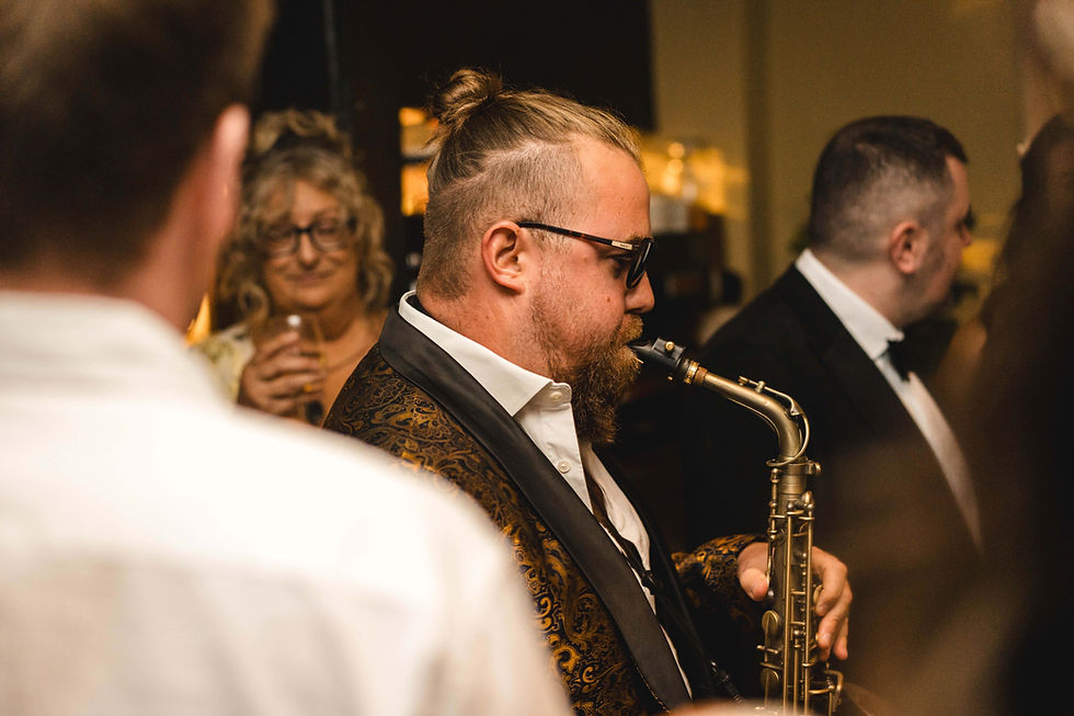 What Do I Need To Know When Booking A Saxophone Player For My Destination Wedding?