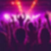 hands up in the air at a party with deep purple lights and background.jpg