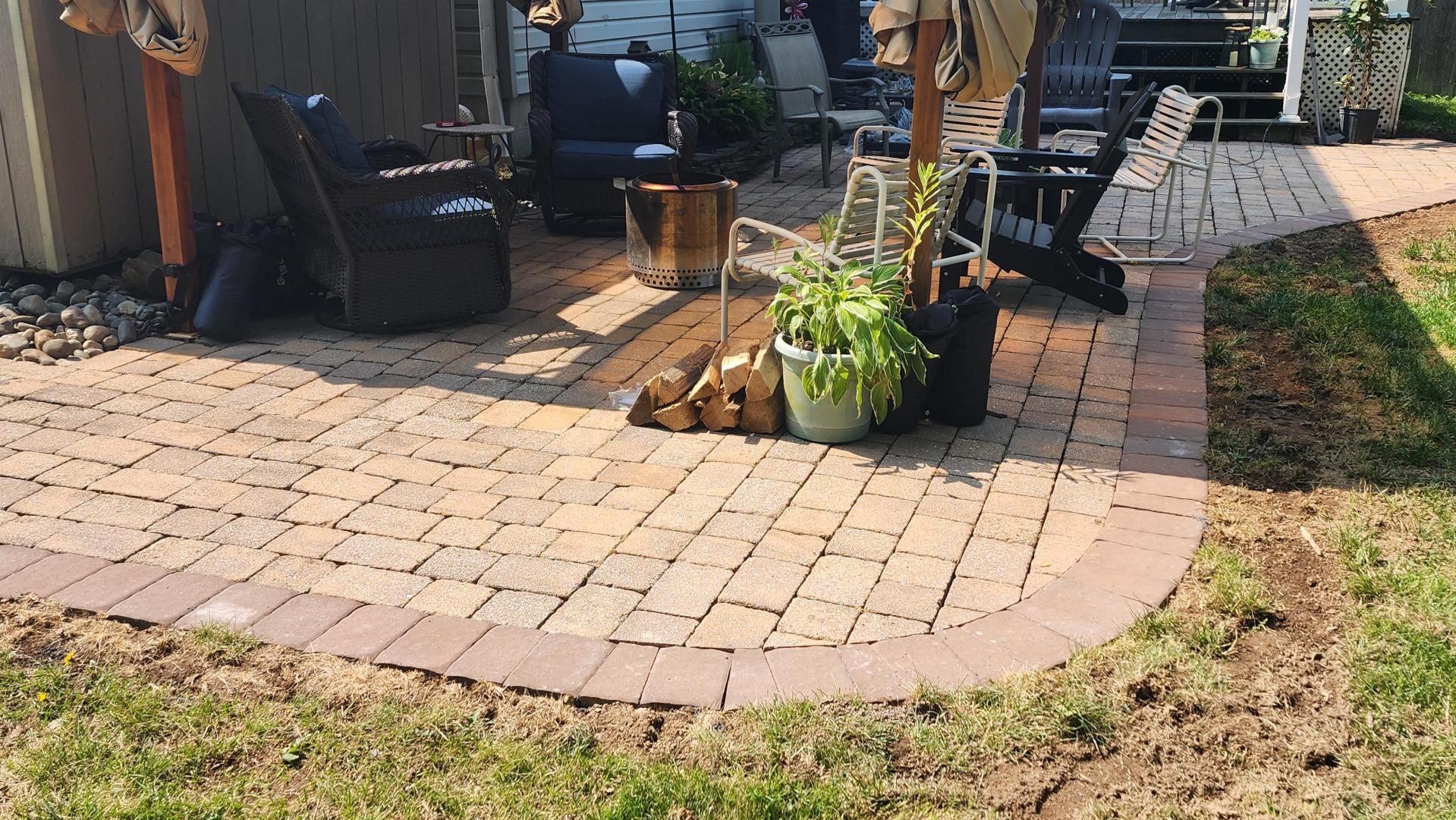 Tan and brown paver patio completed by Fiedler Landscapes