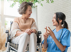 asian-young-caregiver-caring-her-elderly-patient-senior-daycare-handicap-patient-wheelchai