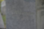 A headstone with "In perpetual memory of my love" inscribed on the side. (Nick Rampe)