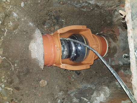 Instalace zpětné klapky do odpadu