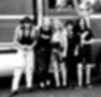 Dead Ringer posing by a tour bus in the USA