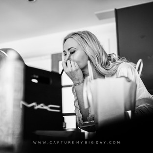 bride doing her make up