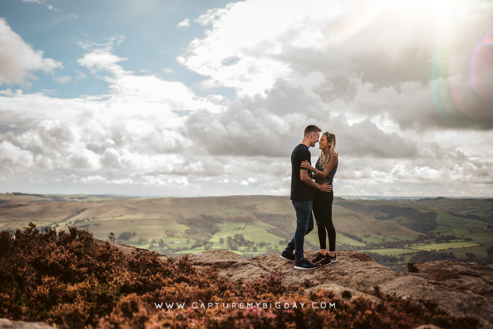 engagement photograph on a hill