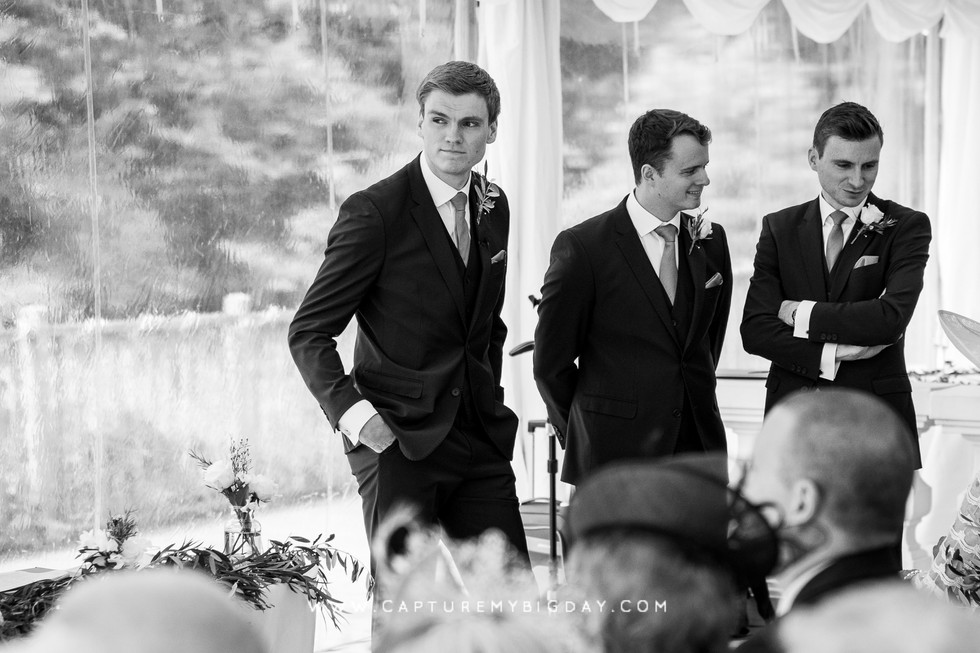 groom waiting with best men
