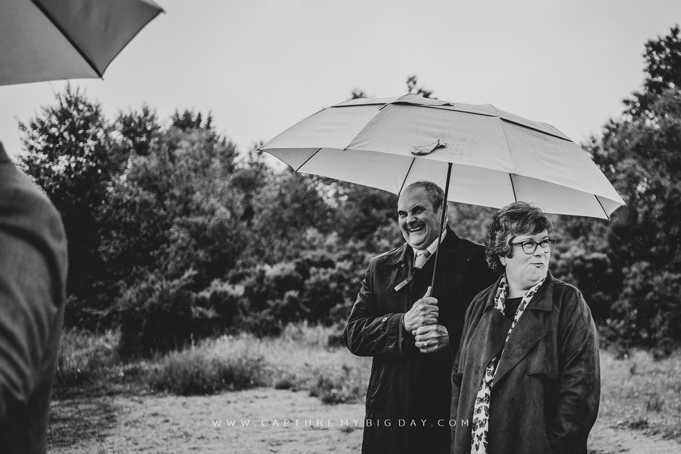 Parents at beach ceremony