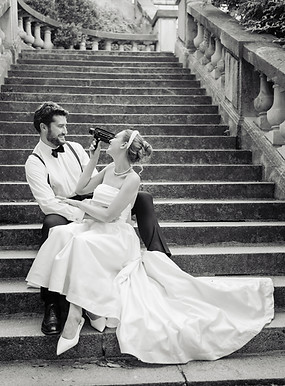 Bride and groom sat on Paris steps