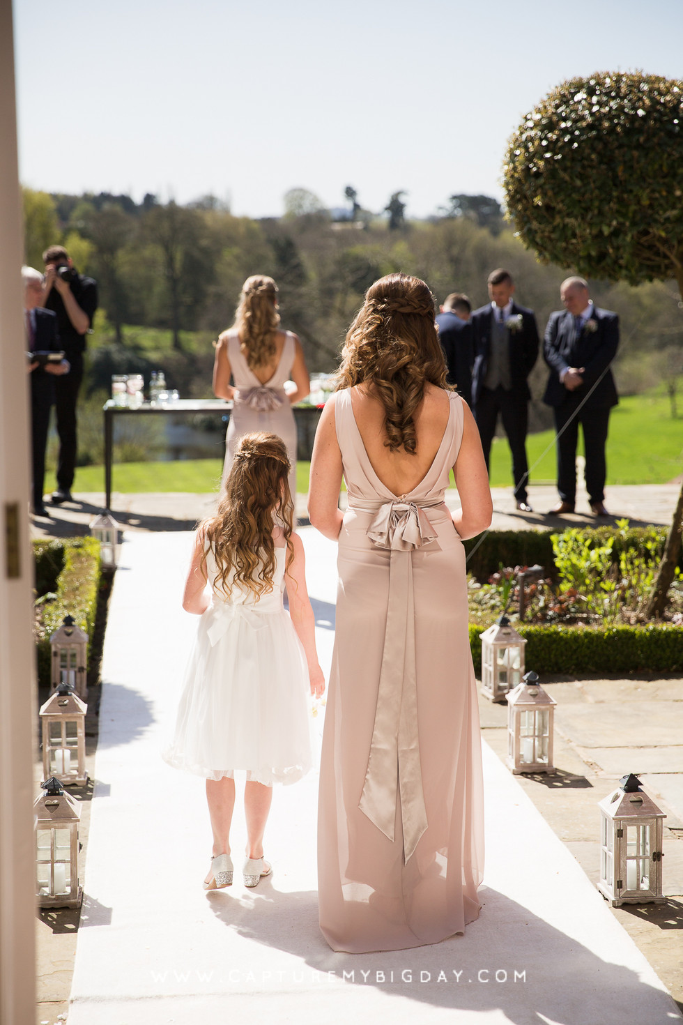 bridesmaid walking down the aisle