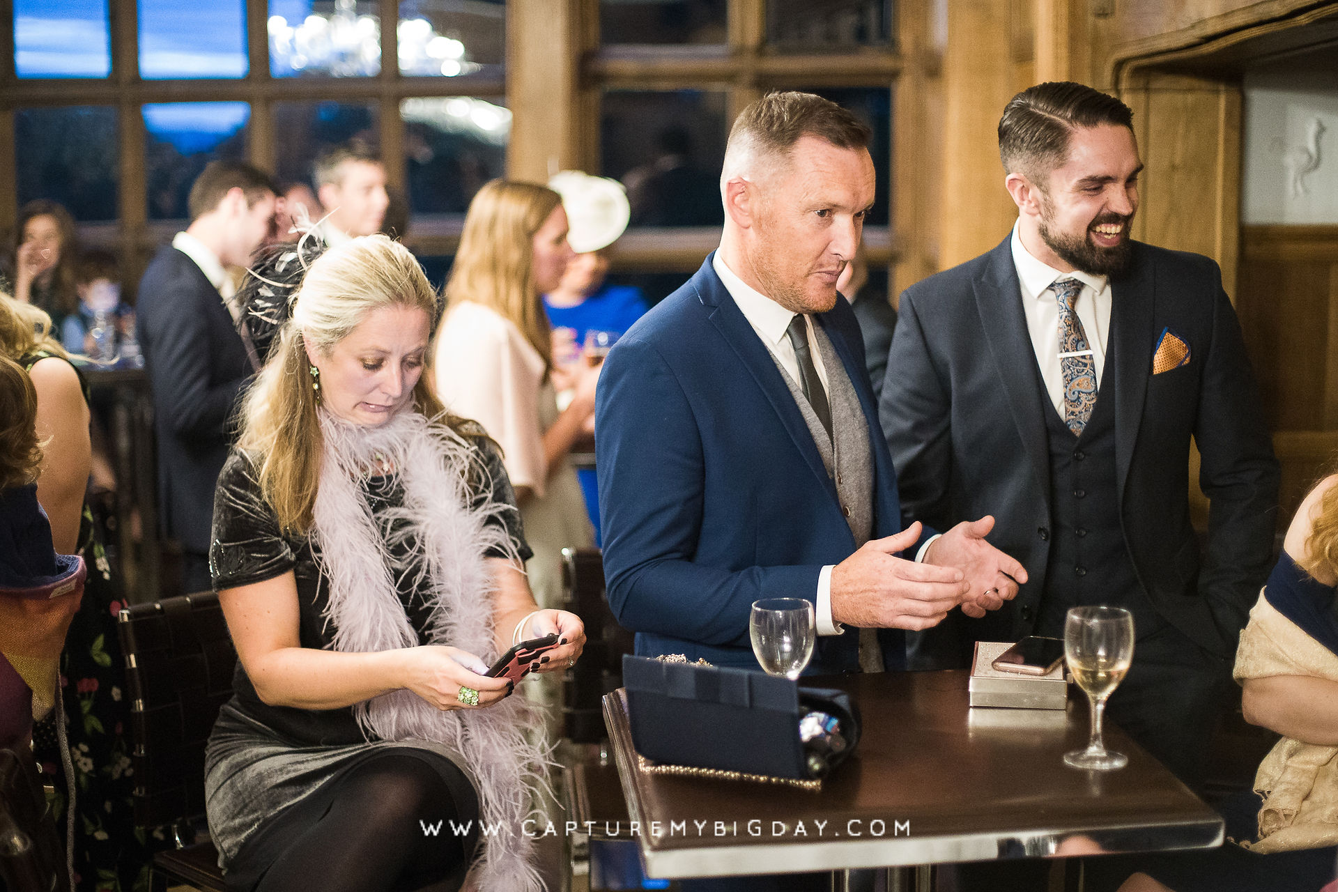 wedding guests at bar