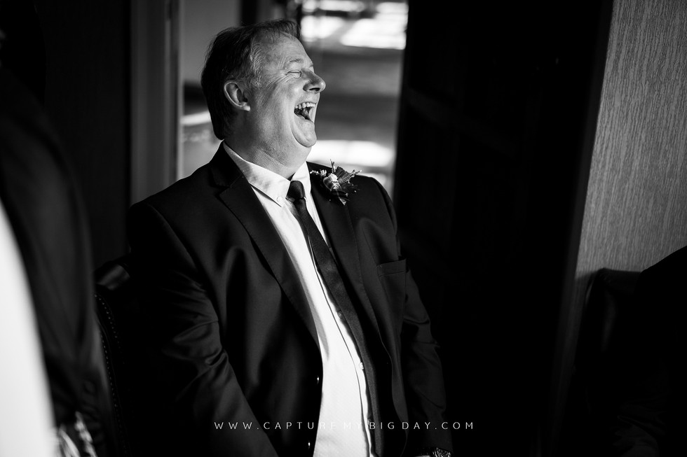 wedding guest laughing