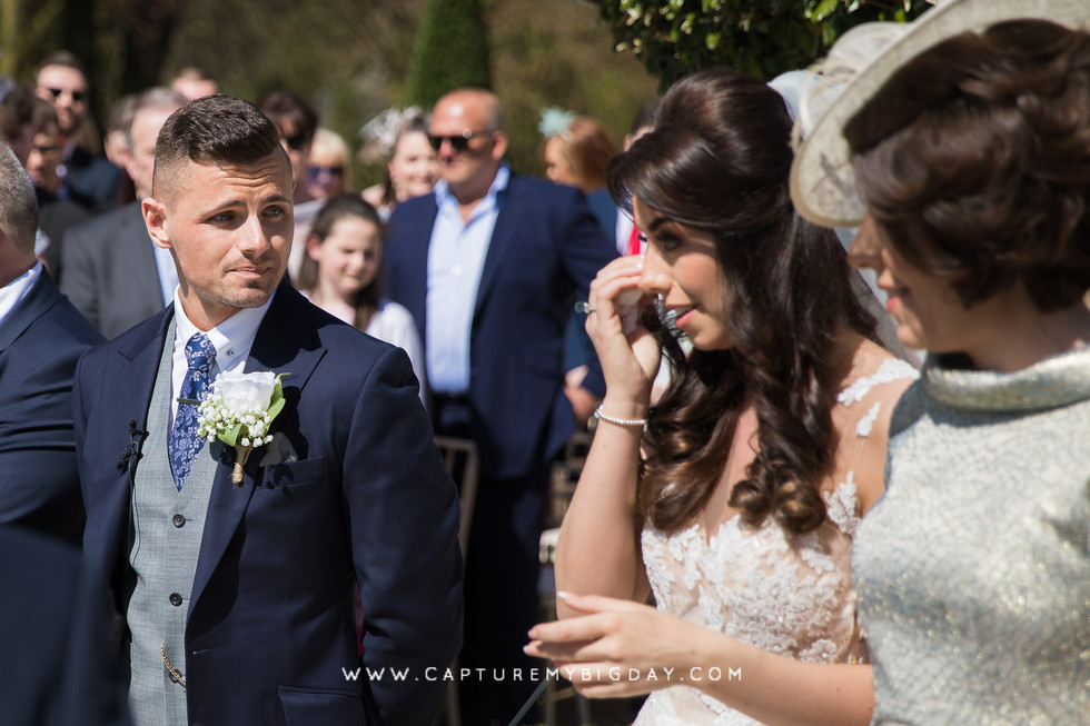 bride crying at ceremony