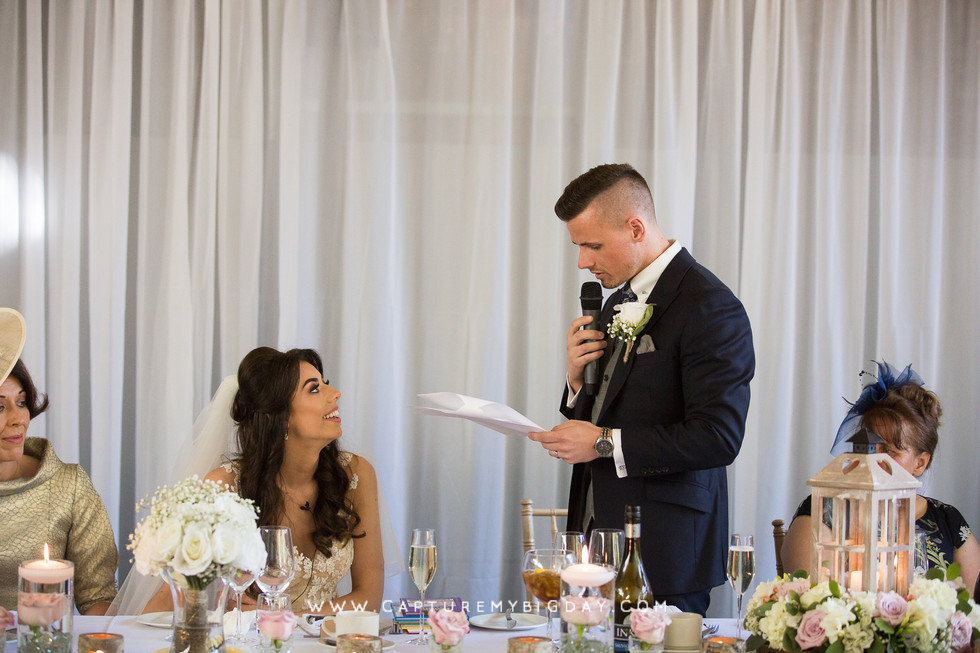 groom reading a speech