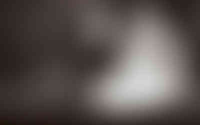 Bride laughing on boat with groom