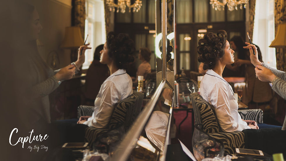 Bride having make up done