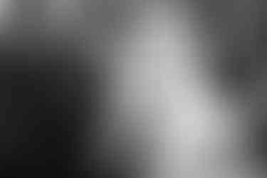 groom waiting at end of aisle