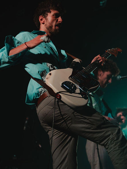 Nathan Becker playing the guitar
