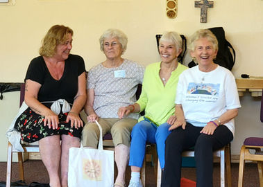 Image of women gathering at the GTW 2023 Annual Gathering