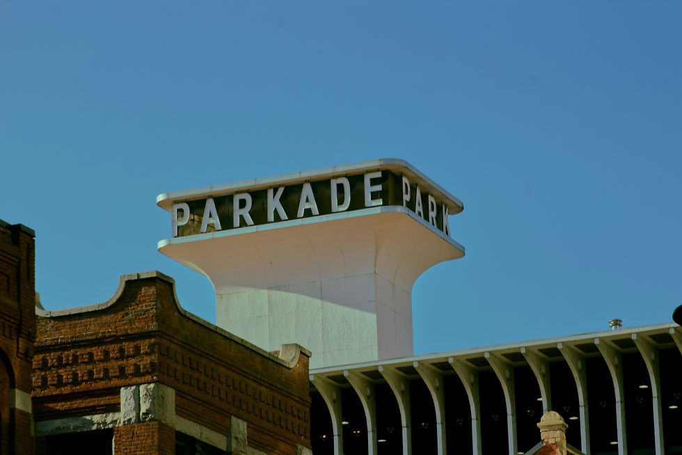 The Parkade: A Mid-Century Gem in Spokane, Washington. The Parkade's futuristic sign and sculptural concrete elements reflect the bold, optimistic design trends of the era, making it one of the city's most iconic modernist structures. Photo by Clay Elliot for Mid-Century Gems.