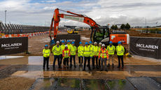 Clients and Senior Staff celebrate with a photo as the start of construction begins.