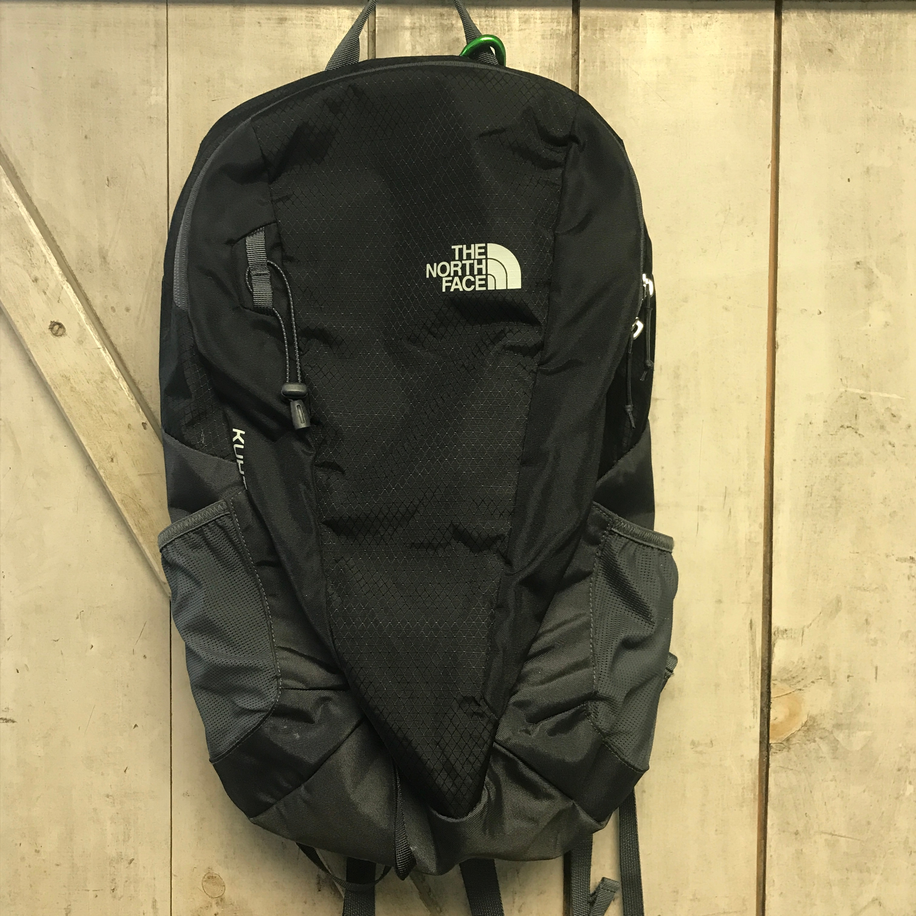 black and rose gold north face bookbag