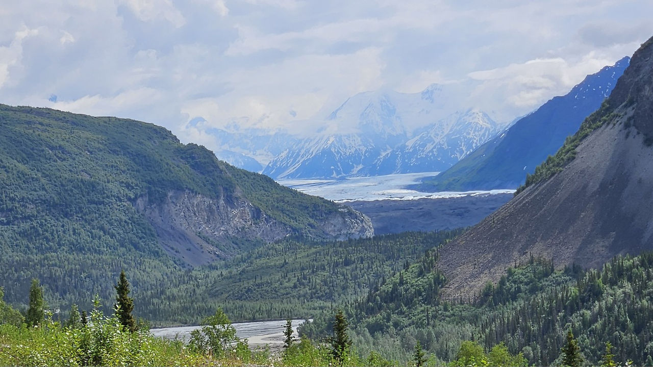 Snow-capped Chugach Mountains with Matanuska Glacier stretching through the valley, seen from the Glenn Highway area