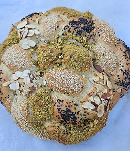 This vegan challah is soft, slightly sweet, and topped with a golden crust from a simple plant-based milk wash. The inside is fluffy and tender, and it’s a bread my kids look forward to every week—it usually disappears before dinner is over. Once you get the hang of it, the dough is easy to work with and can be shaped into braids, rolls, or a round loaf, and you can keep it simple with sesame seeds or dress it up with nuts. It freezes well too, so you can make it ahead for holidays, travel days, or to have ready bread during a busy week.