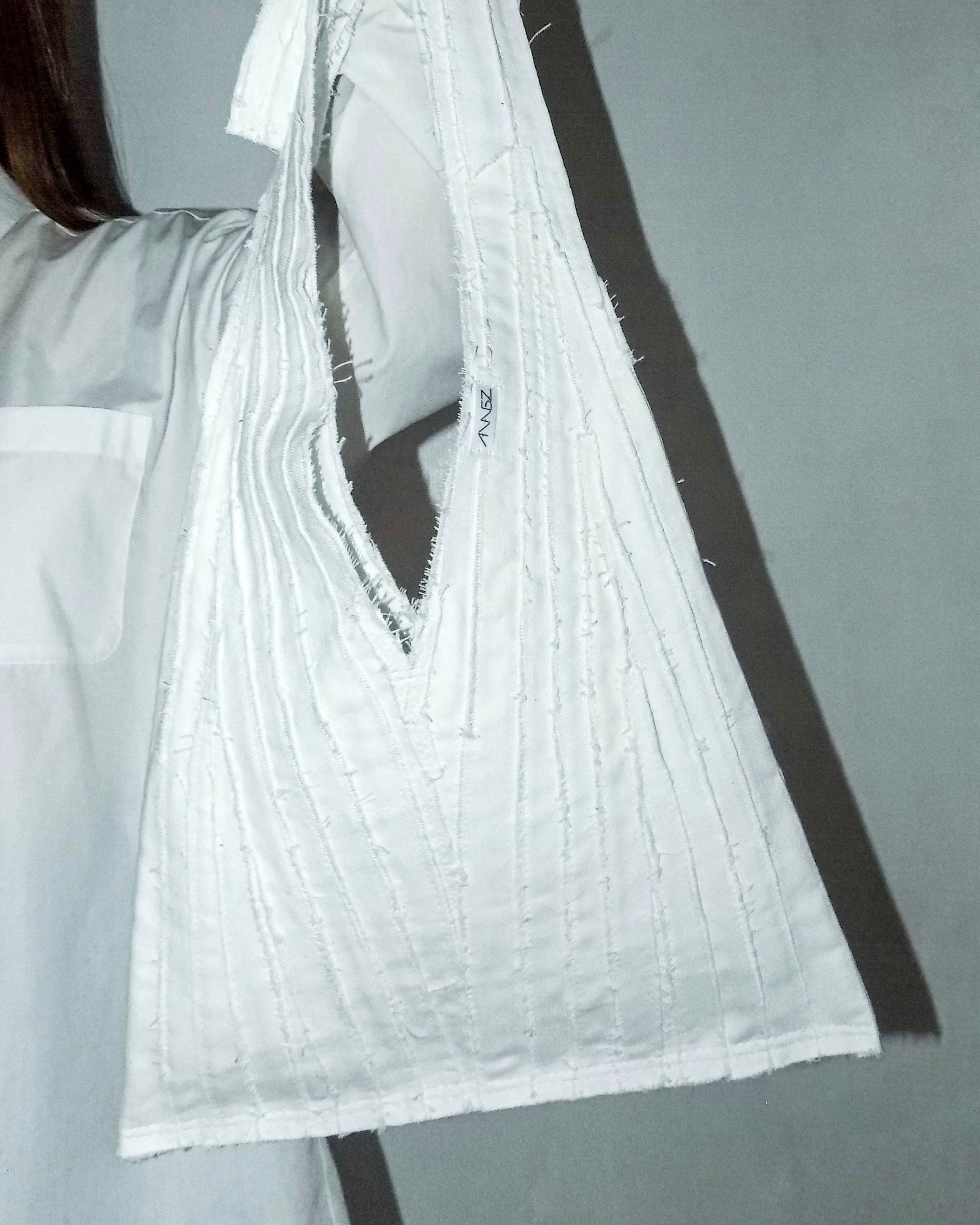 Patched White Triangle Crossbody Bag