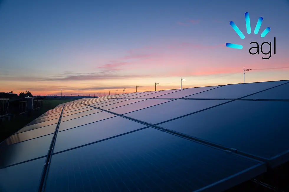 Solar panels at sunset with pink and blue sky, power lines in background. "agl" logo in top right corner, serene mood.