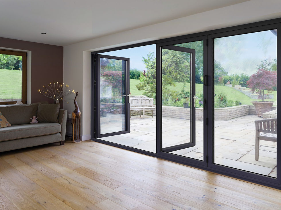 Interior view through open bifolds to rear garden