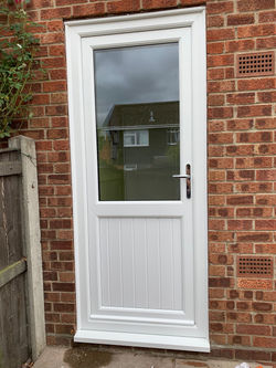 White PVCu back door with full glazed panel