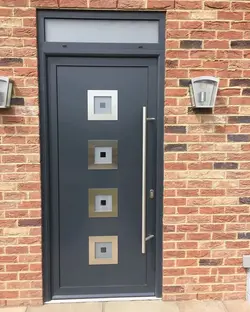 Aluminium door in colour Grey with long bar handle